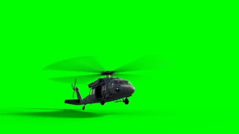 Black Hawk helicopter landing on green screen. Stock Footage