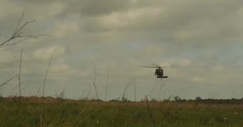 Black Hawk Hovering Video stock 84071524