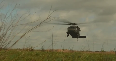 Black Hawk landing exiting frame Video stock 84071509
