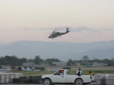 Black Hawk over Port-au-Prince Video stock 8607147