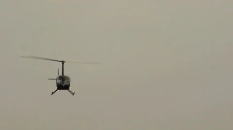 Black helicopter flies Video stock 38398195