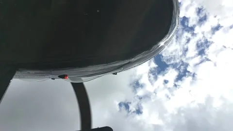 Black helicopter taking off underneath view Vidéo 231132049