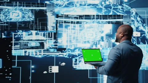 Black high tech engineer holding phone with isolated mockup screen Stock Footage 312477402