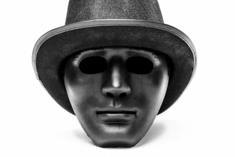 Black human mask in hat Stock Photos