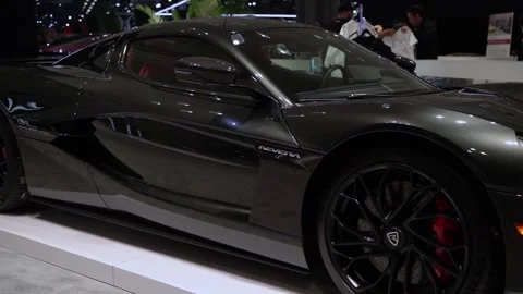 Black hypercar was prominently displayed at the prestigious auto show 스톡 동영상 291627129