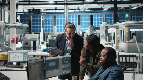 Black industry engineers team working together on solar panel systems Stock Footage 311783822
