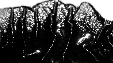 Black ink bleed on white paper Stock Footage 72288050
