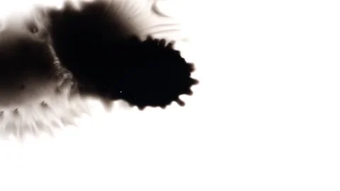 Black ink blot over white paper, Ink blot footage Stock Footage 147703501