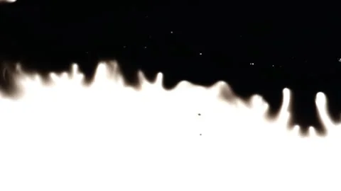 Black ink blot spreading over white paper Stock-Footage 147703265