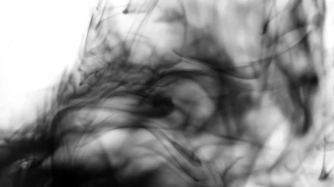 Black ink blurs in a clear liquid. background Stock Footage 73702272