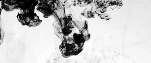 Black ink diffuses down through frame Video stock 136494627