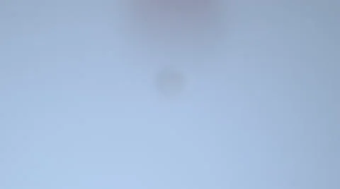 Black ink drop falling in water Stock Footage 46667397