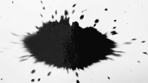 Black ink drop splatters on white paper. Expanding ink bleeds bloom Stock Footage 79352921