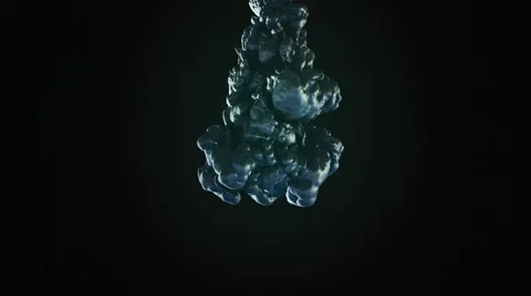 Black ink dropped into water in slow motion isolated on black background Stock Footage 48121540