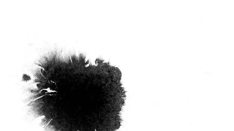Black ink drops splatters spilling on white background Stock Footage 125462703
