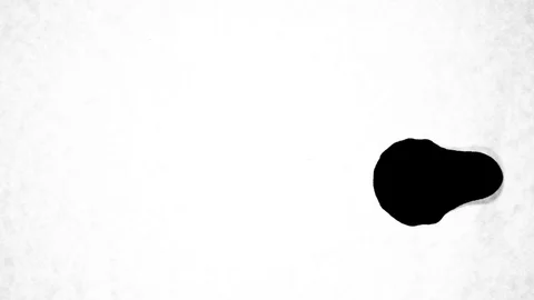 Black ink drops splatters spilling on white background Stock Footage 125463367