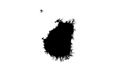 Black ink drops splatters spilling on white background Stock Footage 125463681