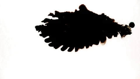 Black ink drops splatters spilling on white background Stock Footage 125469093