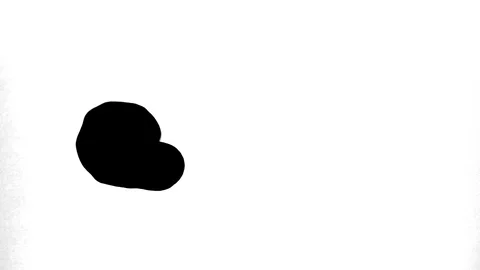 Black ink drops splatters spilling on white background Stock Footage 125471659