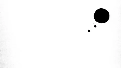Black ink drops splatters spilling on white background Stock Footage 125472194