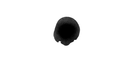 Black ink drops splatters spilling on white background Video stock 125473560