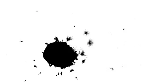 Black ink drops splatters spilling on white background Stock Footage 125473982