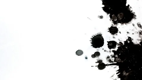 Black ink drops splatters spilling on white background Stock Footage 125474276