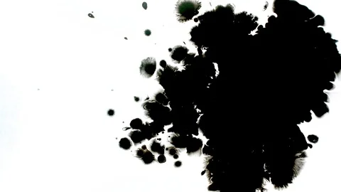 Black ink drops splatters spilling on white background Stock Footage 125475888