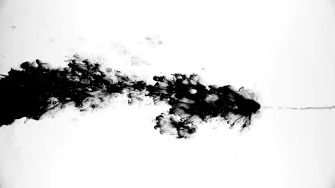 Black ink drops splatters spilling on white background Stock Footage 125476765