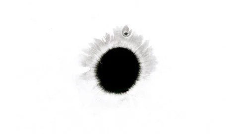 Black ink drops splatters spilling on white background Stock Footage 125477557