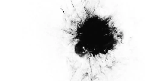Black ink drops on white paper background Видео 37117477