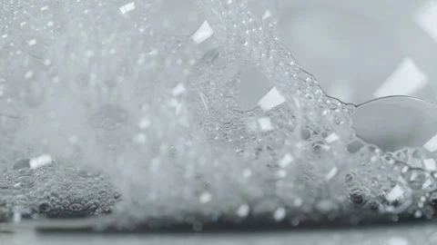 Black Ink Mixing With Soap Bubbles Stock Footage 126906820