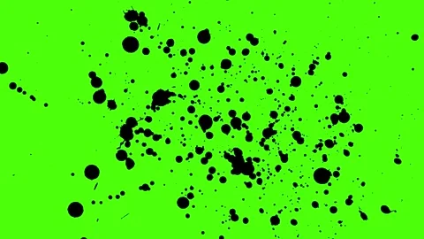 Black ink splatters on bright green background Stock Footage 341742512