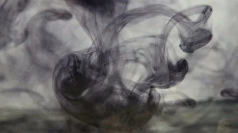 Black ink spread in water Stock Footage 153272658