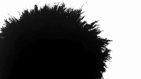 Black ink spreads from the bottom left corner area Video stock 329667570