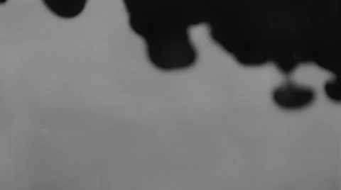 Black ink swirling gray water Video stock 49642453
