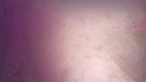Black ink in water abstract background texture slow motion Stock Footage 75455616