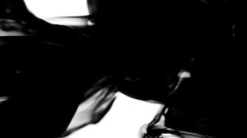 Black ink on a white background spreads and fills the entire screen Stock Footage 248822017