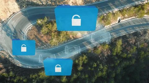 Black intelligence vans with sensitive data on winding road are hacked Foto stock