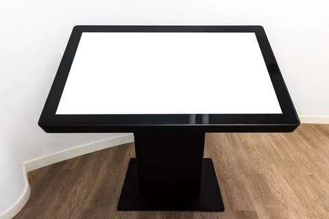 Black interactive touch table with empty blank screen Stock Photos