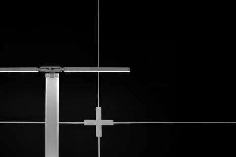 Black interior design wall grid geometry pattern white electric lamp lighting Stock Photos