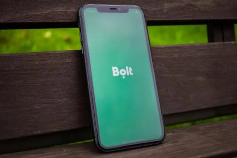 Black iphone with logo of Bolt application on the screen. Stock Photos