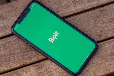 Black iphone with logo of Bolt application on the screen. Stock Photos