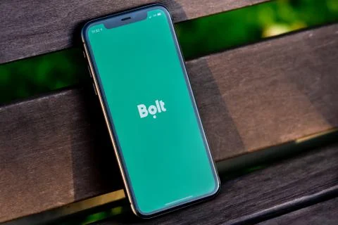 Black iphone with logo of Bolt application on the screen. Stock Photos