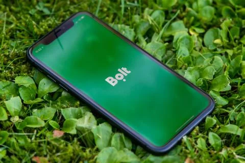 Black iphone with logo of Bolt application on the screen. Stock Photos