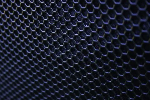 Black iron speaker grid texture. Industrial background Stock Photos