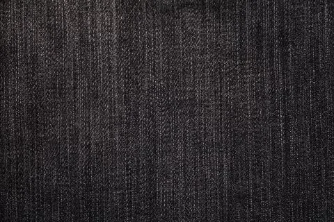 Black jeans background Stock Photos