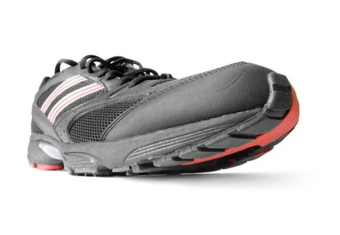 Black jogging shoe Stock Photos