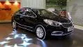 Black KIA Cerato at yearly automotive-show "SIA 2013" in Kiev, Ukraine HD Footage