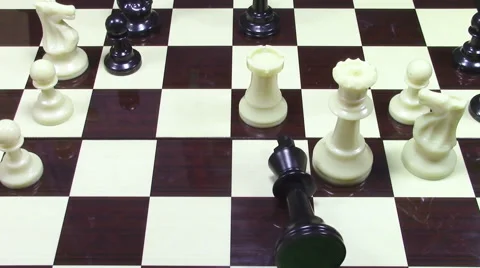 Black king chess piece in mate position Stock-Footage 51965992